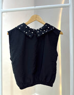Blusa con perlas